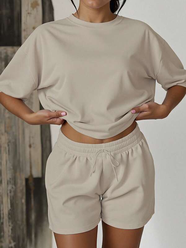 2pcs Women Casual Loose Solid Color Round Neck Short Sleeve T-Shirt And Shorts Set, Suitable For Outings, Sportswear, Thanksgiving, Christmas Casual Wear