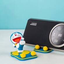 哆啦 A 梦手机支架 - 官方授权的可爱手机支架，非常适合免提观看或为您的工作空间增添乐趣。
