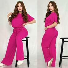 ¡Comodidad y estilo en un solo conjunto! Dale un upgrade a tu outfit con nuestro conjunto de 2 piezas: blusa con resorte + pantalón súper cómodo. Disponible en varios colores, unitalla y XL. ✨ - Rosa Fucsia - Ver 2