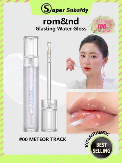 Rom&nd Romand GLASTING WATER TINT 00 METEOR TRACK, fusion de film de rosée respirable, brillance de verre aérienne, technologie de dégradé d'iris, gelée de thé pêche transparente, voile de poussière d'étoile rose gold, brillance d'oxygène de menthe givrée, bâton de retouche mini SOS, édition limitée végétalienne de fête, secret de lumière nue sans maquillage, K-Beauty, maquillage coréen, 4,3g/0,15oz