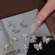10pcs Internet Celebrity Crystal Cat's Eye Butterfly Nail Art Patches, Silver Powder Three-Dimensional Hollow Alloy Diamond Decoration Nail Art DIY Decorative Accessories Suitable For Home Use And Nail Salons, DIY Nail Art Supplies For Women And Girls, Holiday Party Gifts - 白色 - 查看 3