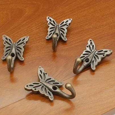 Juego de 6 piezas Ganchos de mariposa bohemios y retro - Organizador versátil de montaje en pared para abrigos, batas, toallas y almacenamiento de cocina, incluye 3 ganchos y 3 tornillos, acabado rústico y elegante, ahorro de espacio, herrajes duraderos para entrada, baño, cocina, armario, sala de estar y lavandería, accesorio ideal para apartamentos pequeños y hogares modernos