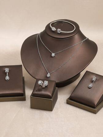 rakol Set de 5 piezas de joyas de lujo para mujer con Cubic Zirconia en cobre con forma de doble lágrima, adecuado para decoración diaria de la mujer