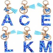 波西米亚风新款时尚女士蓝色爱心字母钥匙扣，树脂材质，带流苏蝴蝶吊坠，可挂在钥匙/钱包/背包/耳机孔等处，是情人节、学校、汽车、可爱哥特风、Y2K风格、圣诞节礼物、包包挂饰、汽车、老师、朋友、姐妹的理想之选。 - 彩色 - 查看 12