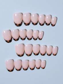 Bộ 24 miếng dán móng tay hình bầu dục họa tiết da báo, chất liệu acrylic, vừa khít hoàn hảo, bao gồm: 1 miếng gel dẻo và 1 dũa móng. Dễ sử dụng, kiểu móng Pháp, phù hợp cho phụ nữ đi làm hàng ngày, dự tiệc và các dịp khác. Dụng cụ làm móng - màu nâu - Xem 3