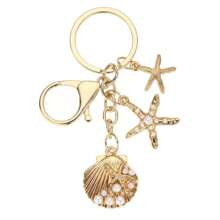 1 pièce Porte-clés style océan doré, pendentif de breloque coquillage, étoile de mer, hippocampe, fausse perle. Accessoire de voiture, de sac, breloque scolaire, fausse perle, gothique mignon Y2K