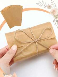 50/100pcs-Kraft Paper Party Favor Bags Pastel Paper Gift Bags, Kraft Bags Party Favor Bags, Small Gift Bags Kraft Paper Bag, Kraft Gift Bag High-Quality Reusable Gift Bags For Halloween Party, Family Gathering Birthdays, Weddings & Small Business Supplies - Khaki - View 5