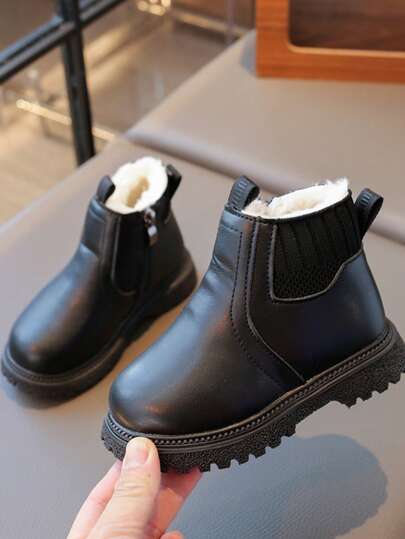 زوج من الأحذية الدافئة ذات اللون الأحادي مع سحاب جانبي للأطفال، ذات قاعدة ناعمة مانعة للانزلاق، بوت شتوية للأطفال