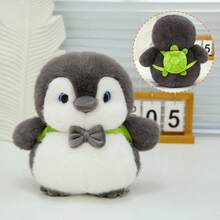 Adorable Rounded Plush Penguin Doll, J-Ellycat's Peanut Penguin Design, Gray, White, And Orange Color Scheme. Soft And Plush, Perfect For Stress Relief And Companionship. A McHugs Favorite, Part Of The PINGU Penguin Family. Hugable Cartoon Doll. Suitable For Graduation Gifts, Party Gifts, Winter Break Gifts, Commemorative Gifts, Birthdays, Valentine's Day, New Year's Gifts, And Winter Travel Souvenirs.