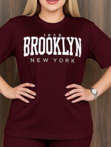 Conjunto de 2 Piezas Oversize Unicolor para Dama Mujer Amplio y Holgado de Blusa de Cuello Redondo Unicolor con estampado de Letras graficas de el estado de California con Manga Corta y Hombros Caídos Cómoda y Pantalón Oversize Holgado Unicolor Sin Bolsillos Moda Otoño Primavera y Verano Estilo Casual y Versatil para Todo Tipo de Ocasion - Color caoba - Ver 2