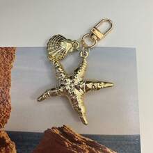 原创海洋风格天然海星贝壳钥匙扣多功能手机挂饰假日包包配件沙滩配件沙滩必需品度假沙滩包背包装饰包钥匙扣