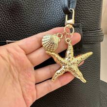 原创海洋风格天然海星贝壳钥匙扣多功能手机挂饰假日包包配件沙滩配件沙滩必需品度假沙滩包背包装饰包钥匙扣
