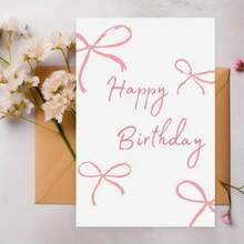 Sanrio 一张精致光滑的生日贺卡，正面饰有漂亮的蝴蝶结。背面设计流畅，尽显高品质。“生日快乐！”精美的设计使其成为送给朋友、家人和同学的理想生日礼物。