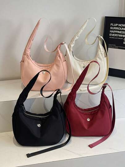 1 pezzo Borsa a mezzaluna in nylon da donna, con chiusura lampo, tracolla regolabile, borsa a forma di raviolo leggera e alla moda, borsa a tracolla per studenti universitari, con elemento decorativo a nappina, adatta per lo shopping, i viaggi e le vacanze, borsa casual per telefono e portamonete