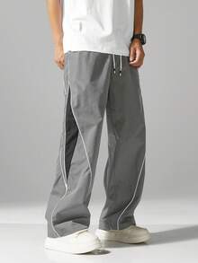 男士街头风慢跑裤 - 轻盈涤纶运动裤，侧边条纹，带口袋和抽绳腰带，撞色休闲运动裤，适合街头穿搭、慢跑、户外休闲、健身房等场合，时尚百搭。 - 灰色 - 查看 2