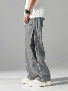 男士街头风慢跑裤 - 轻盈涤纶运动裤，侧边条纹，带口袋和抽绳腰带，撞色休闲运动裤，适合街头穿搭、慢跑、户外休闲、健身房等场合，时尚百搭。 - 灰色 - 查看 4