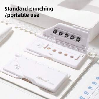 1台便携式5孔打孔机，ABS材质，适用于桌面整理，非常适合装订笔记本和文件、相册，无需电动。兼容A4/B5/A5纸张