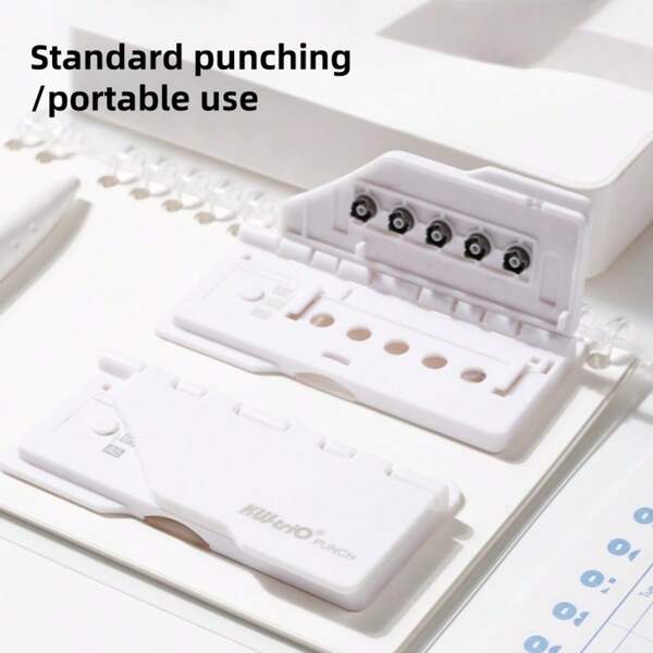 1 Perforatore portatile a 5 fori, realizzato in materiale ABS, adatto per organizzatori da scrivania, perfetto per rilegare quaderni e documenti, rilegatura di album, senza elettricità. Compatibile con carta formato A4/B5/A5