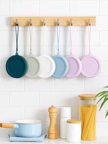 1 pieza Monedero de silicona de estilo simple, bolsa de almacenamiento de gran capacidad y forma redonda, bolsa de color sólido, adecuada para auriculares, cables de datos, lápiz labial, monedas, llaves, etc., tacto suave, fácil de limpiar y cuidar, simple y ligera, espacio razonable, alta portabilidad, adecuada para el hogar, el trabajo, las salidas y los viajes.