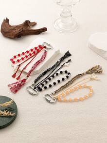 1 pezzo di Portachiavi in stile bohémien alla moda, con catena per borse, corda intrecciata spessa, ciondoli ad occhio di diavolo, cuore, stivali cowboy, sole, palma di cocco, adatto per borse, zaini, trousse da trucco, valigie, portachiavi, accessori intrecciati.