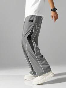 男士街头风慢跑裤 - 轻盈涤纶运动裤，侧边条纹，带口袋和抽绳腰带，撞色休闲运动裤，适合街头穿搭、慢跑、户外休闲、健身房等场合，时尚百搭。 - 灰色 - 查看 7