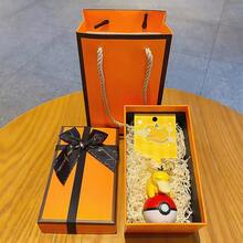 Móc khóa phát sáng Glow Charm - Phụ kiện phát sáng được cấp phép chính thức, có hình Eevee. Chất liệu với các cạnh được mài nhẵn, hoàn hảo để thêm ánh sáng vui nhộn cho túi xách hoặc các hoạt động ban đêm. - Màu vàng tươi - Xem 3