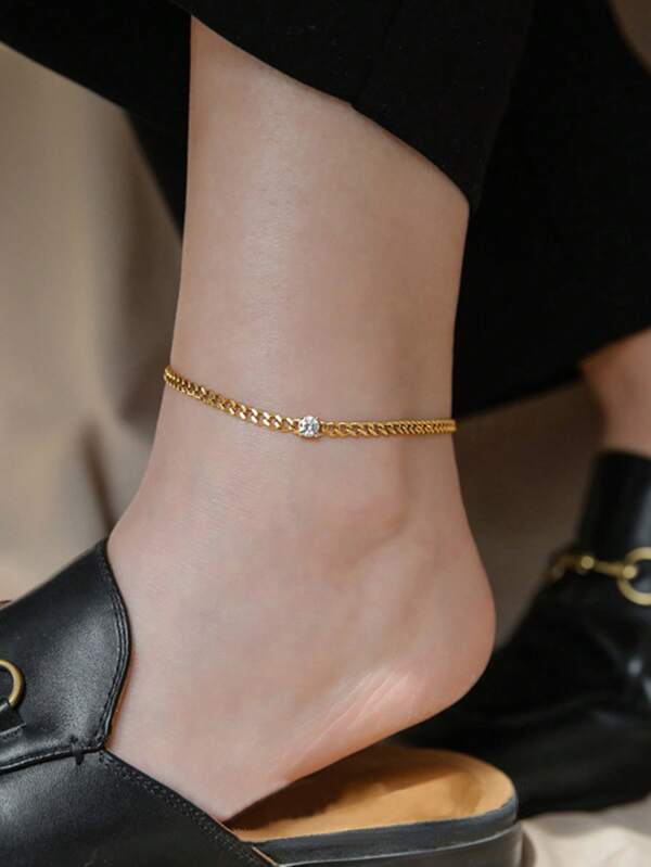 1 pièce Chaîne dorée minimaliste à la mode avec un seul cubique de zircone scintillant, bijou de cheville pour femmes