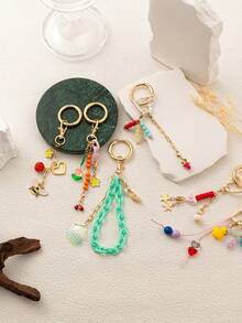 1 pezzo di Portachiavi in stile bohémien alla moda, con catena per borse, corda intrecciata spessa, ciondoli ad occhio di diavolo, cuore, stivali cowboy, sole, palma di cocco, adatto per borse, zaini, trousse da trucco, valigie, portachiavi, accessori intrecciati.