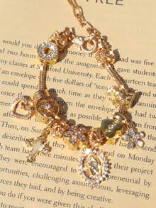 1条心形樱花吊坠手链，1条时尚金色手链，1条夜光十字架手链，1条妈妈天使十字架手链 - 粉色 - 查看 5