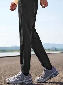 CAMEL CROWN Pantalones casuales para senderismo de secado rápido y protección solar para hombres