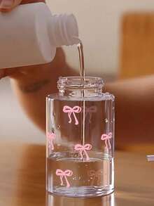 Przezroczysta butelka podróżna z nadrukiem kokardki, wielokrotnego użytku, dozownik do płynu do demakijażu, butelka z dozownikiem z pompką 3,38 uncji/6,76 uncji do zmywacza do paznokci, toniku i płynu do demakijażu, z kopułą, tylko do mycia rąk, wielokrotnego użytku, butelka do demakijażu