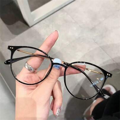 1副女士圆形PC镜框金属镜腿简约透明眼镜