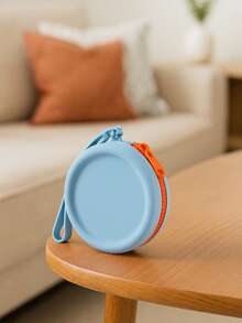 1 pieza Monedero de silicona de estilo simple, bolsa de almacenamiento de gran capacidad y forma redonda, bolsa de color sólido, adecuada para auriculares, cables de datos, lápiz labial, monedas, llaves, etc., tacto suave, fácil de limpiar y cuidar, simple y ligera, espacio razonable, alta portabilidad, adecuada para el hogar, el trabajo, las salidas y los viajes.