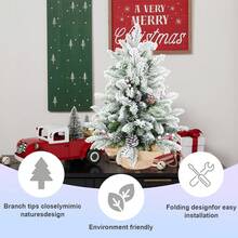 3ft PE/PVC Decorative Flocked Jute Tabletop Tree With Red Fruit And Pine Cone Decorations. The Burlap-Wrapped Base Features Realistic Leaves And A Foldable Design For Easy Installation. Suitable For Bedrooms, Living Room Entryways, Schools, And Offices.
