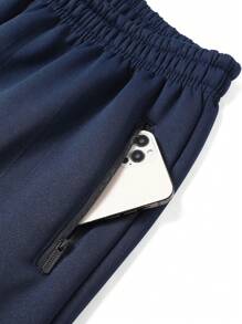 1 pieza de pantalones casuales de hombre con cordones en las piernas y bolsillos con cremallera, con forro de lana de cordero grueso para mantener el calor y una experiencia de uso cómoda y acogedora.