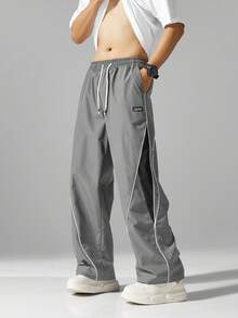男士街头风慢跑裤 - 轻盈涤纶运动裤，侧边条纹，带口袋和抽绳腰带，撞色休闲运动裤，适合街头穿搭、慢跑、户外休闲、健身房等场合，时尚百搭。 - 灰色 - 查看 8