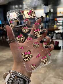 Sanrio 1 pieza Funda protectora de teléfono con diseño de estampado de leopardo y lazo rosa de Hello Kitty, adecuada como regalo para novia, hermana, amiga, tía, mamá, parejas, cumpleaños, compatible con iPhone 17/16/15/14/13/12/11/Pro/ProMax/X/XR/XS/XSMAX/7/8/PLUS y modelos