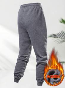 男士保暖运动裤，带口袋和抽绳，撞色皮革贴片，腰部可调节，裤脚收口，穿着舒适。 - 深灰色 - 查看 2
