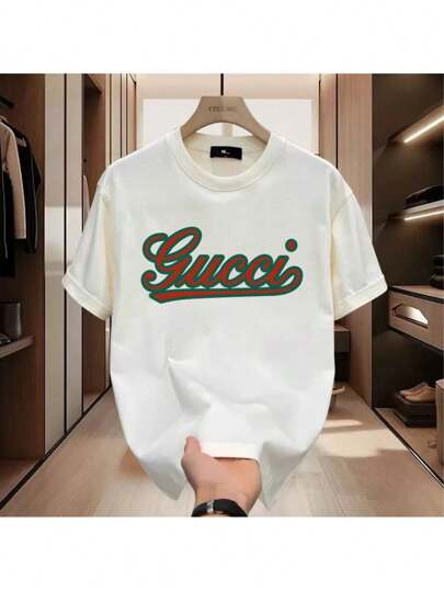 New unisex T-shirt for men and women, featuring a round neck design made from 100% pure cotton with letter prints. It is soft and comfortable, making it perfect for a casual summer street style for men.