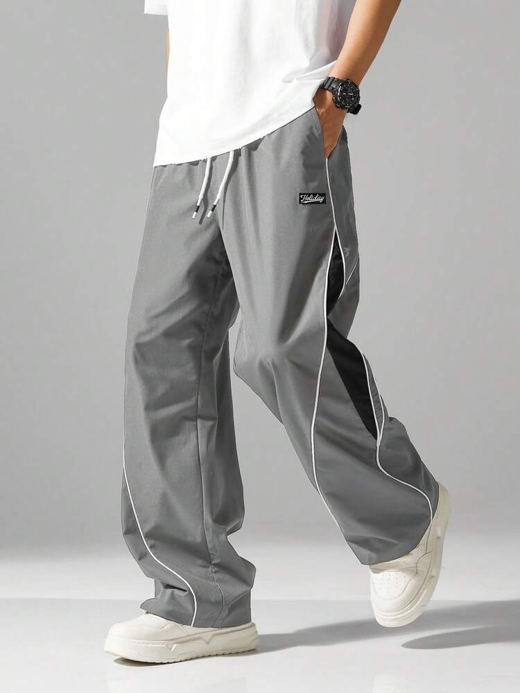 男士街头风慢跑裤 - 轻盈涤纶运动裤，侧边条纹，带口袋和抽绳腰带，撞色休闲运动裤，适合街头穿搭、慢跑、户外休闲、健身房等场合，时尚百搭。 - 灰色 - 查看 9