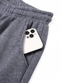 男士保暖运动裤，带口袋和抽绳，撞色皮革贴片，腰部可调节，裤脚收口，穿着舒适。 - 深灰色 - 查看 5