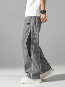 男士街头风慢跑裤 - 轻盈涤纶运动裤，侧边条纹，带口袋和抽绳腰带，撞色休闲运动裤，适合街头穿搭、慢跑、户外休闲、健身房等场合，时尚百搭。 - 灰色 - 查看 5