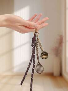 1 pezzo Ciondolo portachiavi vintage a forma di racchetta da tennis - Pendente vintage in bronzo con nappina, campanellino e catena, accessorio sportivo carino per donne e ragazze, decorazione per borse, zaini, regalo creativo per appassionati di tennis, uso quotidiano per scuola, ufficio, stile vintage e elegante, accessorio per borse di coppia, decorazione per adolescenti, donne, studenti universitari, rookie, Ognissanti, Natale