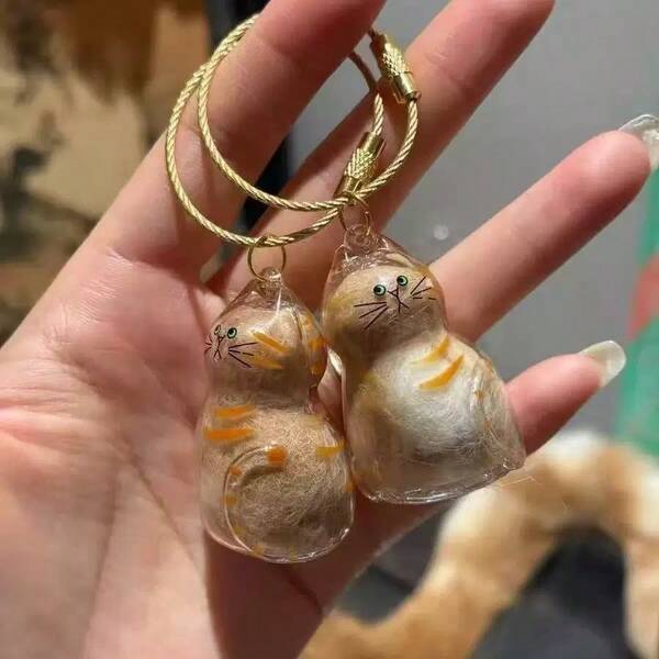 Chaveiro com pingente de coleção de pelos de gato, 2 peças, acessório criativo de coleção de pelos de gato, coleção de pelos de animal de estimação, pequeno presente memorial, chaveiro com pingente de coleção de pelos de animal de estimação com aparência de desenho animado