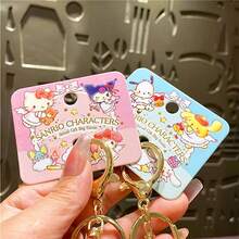 三丽鸥天使吊饰 - 官方授权配饰，饰有梦幻天使图案。可调节链条，细节精致，完美搭配包袋或钥匙，提升您的日常造型。 - 黃色 - 查看 5