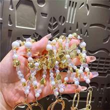 三丽鸥天使吊饰 - 官方授权配饰，饰有梦幻天使图案。可调节链条，细节精致，完美搭配包袋或钥匙，提升您的日常造型。 - 綠色 - 查看 3