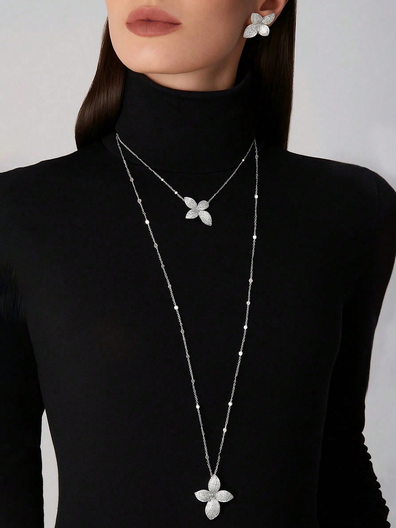 مجموعة مجوهرات من قلادة وأقراط بتصميم أوروبي وأمري...