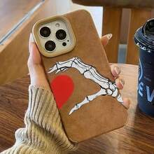 Teléfono con diseño de calavera y corazón. Lente de alta definición. Compatible con phone XS, 12 Pro y 15 Pro. Además, 13, 16, 14 y 11. Cuenta con una construcción de piel sintética suave, resistente y que cubre todo el contorno. - Colores mixtos 1 - Ver 4