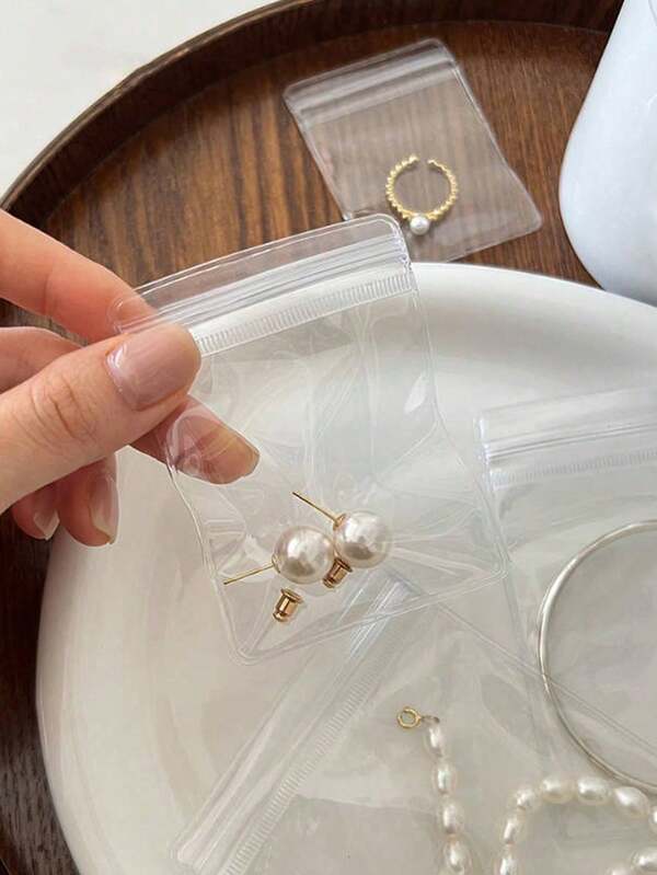 100pcs/5pcs Holiday Party Transparent Plastic Gift Bags, Oxidation-Resistant PVC Jewelry Ring Earring Accessory Storage Bags, Jewelry Pouches. PVC Transparent Sealed Anti-Oxidation Bags, Prevent Loss Of Luster, Reusable For Earrings, Necklaces, Jewelry, Small Gifts, Party Favors. Transparent Card Storage Bags, Anti-Magnetic Bank Card Holder, Silicone Clear Card Protector For ID, Driver's License, Credit/Debit Cards, Sports Cards, Gift Cards