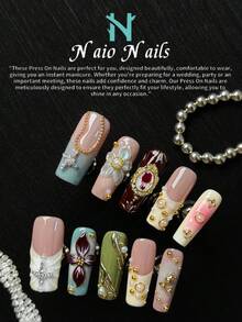 NAIO 春夏手工美甲花园系列，长方形按压式人造指甲，包含饰有3D浮雕花朵、金色十字架宗教符号、金色边框和珍珠水钻的白色法式美甲贴纸，专为女性和女孩设计的美甲用品，每套10片，适合派对、庆典、日常佩戴，是送给女性和女孩的绝佳礼物。 - 彩色 - 查看 4